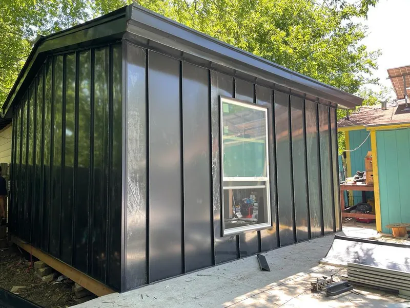 Black standing seam metal wall panels for Metal Roof Installation in Tamarac