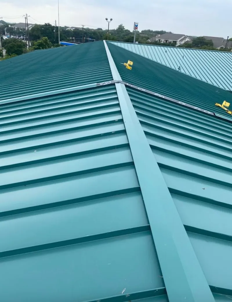Green commercial metal roof ridge and valley for Metal Roof Repair in Tamarac